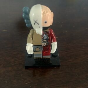 Kaws Figure with display case